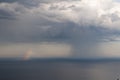 Rainbow over sea water Royalty Free Stock Photo