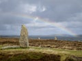 A rainbow over standing stones in The Ring of Brodgar in Orkney, Scotland, UK Royalty Free Stock Photo