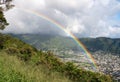 Rainbow over the suburbs of Woodlawn and Manoa in Honolulu, Oahu