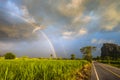 Rainbow on the Country Roadside Royalty Free Stock Photo