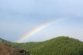 Rainbow over a taiga, Stolby park Royalty Free Stock Photo
