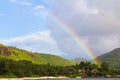 Rainbow over tropical island and luxurious hotel Royalty Free Stock Photo