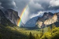 a rainbow over a valley with mountains and trees Royalty Free Stock Photo