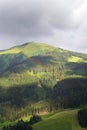 Rainbow over valley with Schattberg Mountain, Saalbach-Hinterglemm, Austria Royalty Free Stock Photo