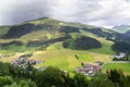 Rainbow over valley with Schattberg Mountain, Saalbach-Hinterglemm, Austria