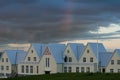 Reykjavik, 2008, June, Rainbow over vernacular Iclandic houses in an overcast day