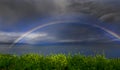 Rainbow over water Royalty Free Stock Photo