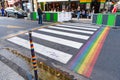 Rainbow pedestrian crossings painted on roads for LGBT community in the Marais district of Paris, France Royalty Free Stock Photo