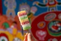 Rainbow popsicle sell at Rainbow village, colourful graffiti painted on house