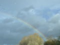 Rainbow and rain from a moving car