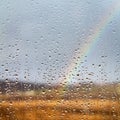 Rainbow through rained window Royalty Free Stock Photo