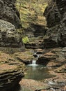 small falls at watkins glen state park (waterfall in a gorge with stone bridge, staircase, rock formation) Royalty Free Stock Photo