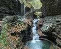rainbow ralls at watkins glen state park (waterfall in a gorge with stone bridge, staircase, rock formation) Royalty Free Stock Photo