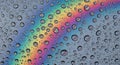 Rainbow reflection on water droplets background Royalty Free Stock Photo