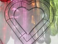 Rainbow reflections, wire heart frame