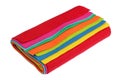 Rainbow of rolled soft felt rags rolled into sausage isolated