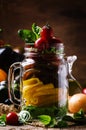 Rainbow salad from colorful tomatoes, onion, pepper and basil wi Royalty Free Stock Photo