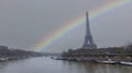 Rainbow scene in The Eiffel Tower, iconic Paris landmark as autumn trees park as Seine river scene in Paris ,France