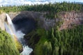 Rainbow shining at Helmcken Falls in Wells Gray Provincial Park near Clearwater, British Columbia, Canada Helmcken Falls is a 141 Royalty Free Stock Photo