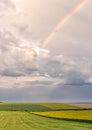 Rainbow. the sky after the rain. field and the sky after the rain. a rainbow in the sky Royalty Free Stock Photo