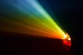 Beautiful rainbow color wide lens projector with light beam for movie and cinema at night . smoke texture spotlight . Royalty Free Stock Photo