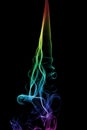 Rainbow Smoke Trail on Black Background Royalty Free Stock Photo