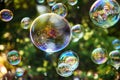 Rainbow soap bubbles on a dark blurred background. blower bubbles Royalty Free Stock Photo