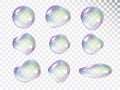 Rainbow soap bubbles with highlights and reflections of various shapes isolated on a light background. Set of transparent Royalty Free Stock Photo