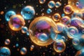 Rainbow soap bubbles in sunlight on a dark background Royalty Free Stock Photo