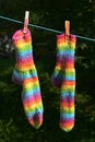 Rainbow socks hang on the clothesline Royalty Free Stock Photo