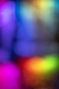 Rainbow spectrum of flowing colorful bokeh lights at night