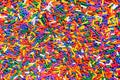 Rainbow sprinkles background Royalty Free Stock Photo