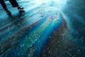 Rainbow stains on asphalt close up Royalty Free Stock Photo