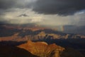 Rainbow, storm clouds and sun on Grand Canyon, Arizona Royalty Free Stock Photo