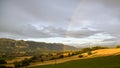 Rainbow at sunset in the countryside in Italy Royalty Free Stock Photo