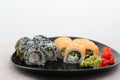 Rainbow Sushi Roll with salmon, eel, tuna, avocado, royal prawn, cream cheese Philadelphia, caviar tobica, chuka. Sushi