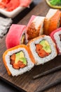 Rainbow sushi roll with salmon, tuna and eel