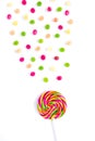 Rainbow sweet sweet bright round lollipop and many colorful little lollipops on a white background Royalty Free Stock Photo