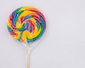 Rainbow swirl sucker, cellophane covered lollipop