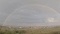 Raining day. Rainbow in the thunderstorm. Royalty Free Stock Photo