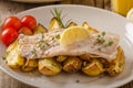 Rainbow trout fillet with roasted potatoes Royalty Free Stock Photo