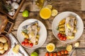 Rainbow trout fillet with roasted potatoes Royalty Free Stock Photo