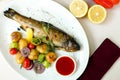 Rainbow trout with grilled vegetables and citrus sauce Royalty Free Stock Photo