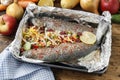 Rainbow trouts with cut vegetables Royalty Free Stock Photo