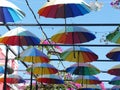 Rainbow umbrellas displayed in puerto plata