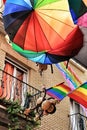 Rainbow umbrellas and flags decorating the streets