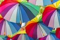 Rainbow Umbrellas hanging overhead in 4th Arrondissement, Le Marais, Paris, France