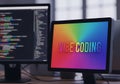 Rainbow Vibe Coding Display on Computer Screen text Royalty Free Stock Photo
