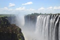 Rainbow at Victoria Falls, the largest waterfall in Africa, on the border of Zambia and Zimbabwe Royalty Free Stock Photo