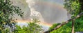 Rainbow at the Victoria Falls on Zambezi River, border of Zambia and Zimbabwe Royalty Free Stock Photo